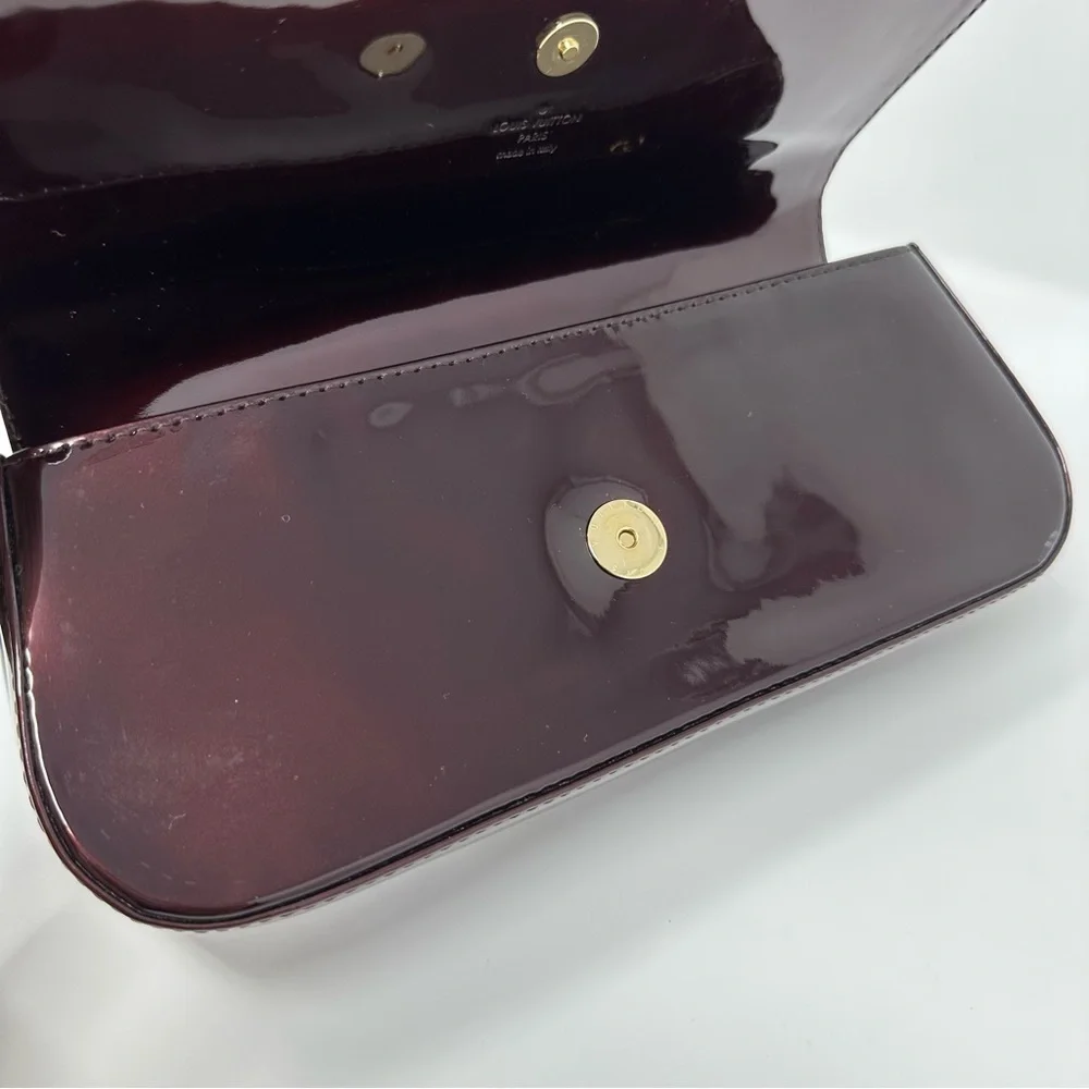 Louis Vuitton Dark Burgundy Clutch with Gold Logo